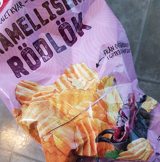 Lila chipspåse, tom.